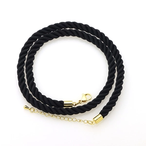 Detail of 6mm black braided polyester necklace cord with gold metal lobster clasp and chain