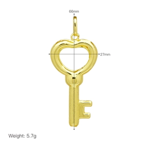 Detailed dimensions of a gold heart key pendant showing 66mm height and 27mm width