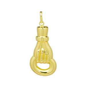 Close-up of polished gold metal Figa hand gesture lucky charm pendant with loop