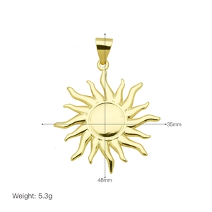 Macro shot showing dimensions of sun pendant necklace in 18K gold plated copper