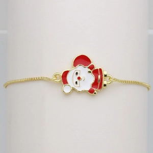 Detailed close-up of a Santa Claus enamel charm on a golden adjustable box chain bracelet