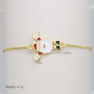 Detailed macro view of a Christmas Santa enamel pendant on a gold adjustable box chain