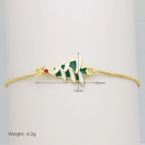 Detail of Christmas tree charm on golden adjustable chain showing 25mm width dimensions