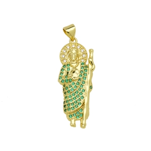 Macro detail of gold Saint Jude pendant featuring green and white cubic zirconia stones