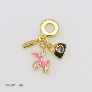 Detailed view of lucky charm pendant set with pink balloon dog and heart gemstone
