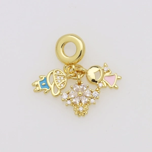 Close-up of golden enamel pendants featuring boy, girl, and zircon flower charms