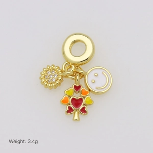 Detailed close-up of colorful heart tree, sun flower and smile face charm pendants