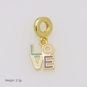 Macro shot of LOVE charm with colorful enamel inlay for gold bracelets and necklaces