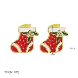 Detailed macro view of red enamel Christmas stocking earrings with gold accents and sizing