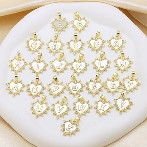 Gold heart initial pendant necklace with shell inlay and micro-pave zirconia charms