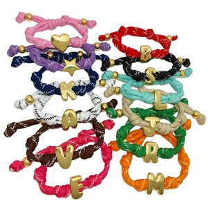 Colorful adjustable woven rope bracelets with gold electroplated initial letter charms