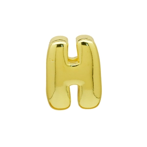 Macro detail of a 3D bubble letter H charm in polished gold finish for DIY jewelry
