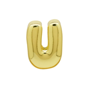 Macro shot of gold balloon-style letter U pendant with a polished mirror finish surface
