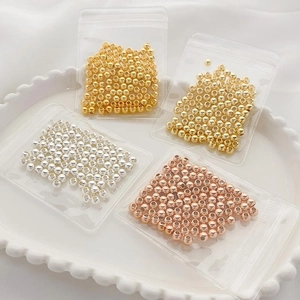 Polished 14K gold filled round spacer beads in gold, silver, and rose gold finishes