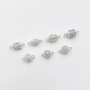 Micro-pasted zircon pendants in multiple shapes with 14K gold plated dual-link rings