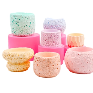 Pink silicone molds for rock texture flower pots and DIY handmade scented candle jars