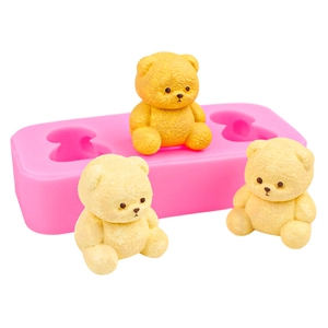 Pink 3-cavity silicone mold for sitting teddy bears with realistic fur texture detail