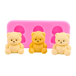 Pink silicone mold with three bear cavities for DIY candles and resin crafts