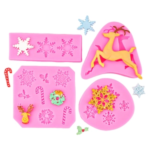 Roze siliconen kerstvormen met sneeuwvlokken en rendieren voor fondant en taartdecoratie