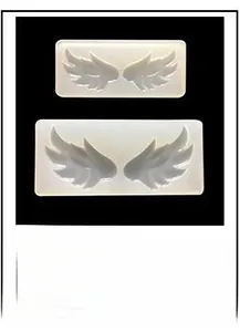 Macro view of white silicone wing molds for DIY clay and resin crafting projects