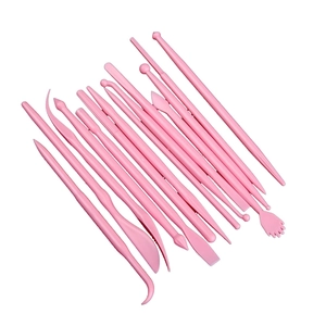 Professional 14-piece pink clay modeling tool set for sculpting and fondant shaping