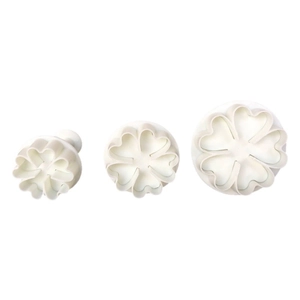 Set of 3 white floral cookie plunger cutters in different sizes for baking and fondant