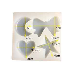 Translucent silicone mold with moon, star, heart and bow shapes for DIY resin crafts