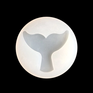 Detailed top view of a translucent silicone mermaid tail mold for DIY resin crafts
