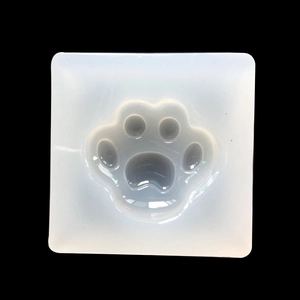 Translucent cat paw silicone mold for UV resin jewelry pendants with paw print texture