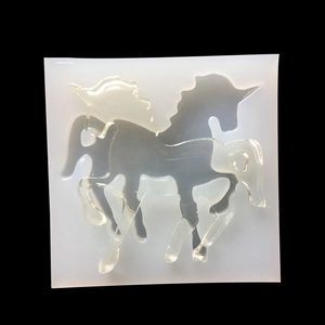 3D unicorn silicone mold for DIY resin casting with a finished clear crystal Pegasus pendant