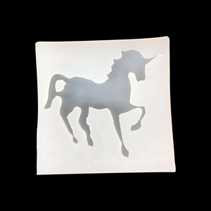 3D unicorn silicone mold for resin jewelry and DIY craft making on black background