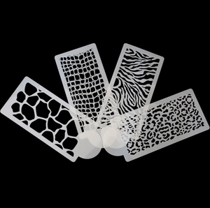 4-piece animal print cake stencil set with giraffe, zebra, and leopard patterns