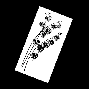 Macro detail of a white stencils sheet with a black Physalis branch pattern for cakes