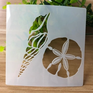 Detail of seashell and sand dollar stencils for DIY painting and cake decorating