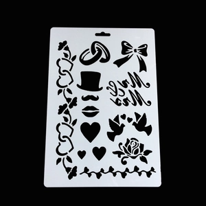 Stencil bianco a tema matrimonio con scritte Mr & Mrs e fiori su sfondo nero per fai da te