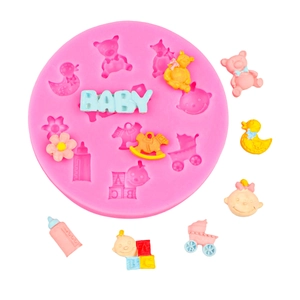 Pink silicone baby shower mold featuring teddy bears, ducks, and BABY lettering for fondant
