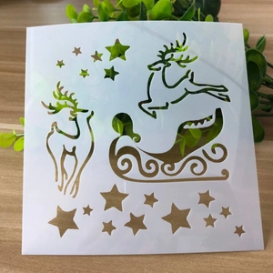 Detalle de plantilla navideña de PVC con renos y trineo para dibujo de álbumes de bricolaje