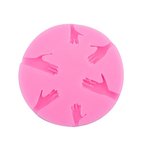 Detailed view of pink circular silicone mold featuring five hand-shaped cavities for DIY crafts