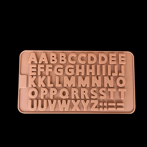 Brown silicone mold with A-Z alphabet and symbols for baking chocolate or jelly