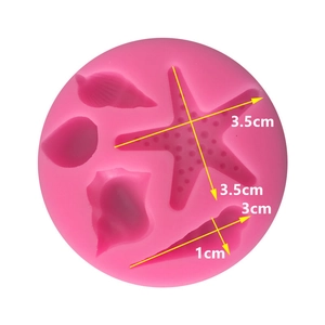 Detail view of pink ocean theme silicone mold with starfish and seashell dimension markings