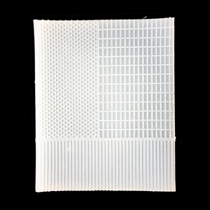Silicone texture mat for fondant and clay featuring woven lattice and striped patterns