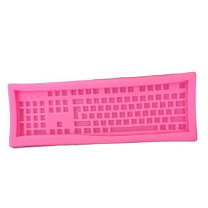 Pink silicone chocolate mold with detailed computer keyboard design for DIY baking and crafts