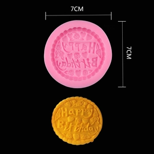 Detailed macro view of 7cm pink silicone cake mold with Happy Birthday floral engraving