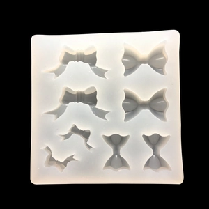 Macro shot of flexible 8-cavity bow knot silicone mold for crystal resin DIY crafts