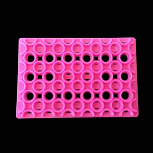 Pink rectangular non-slip silicone drainage mat with circular hollow patterns for bathroom
