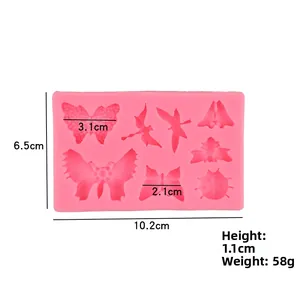 Macro view of pink silicone insect mold with detailed size markings of 10.2cm by 6.5cm