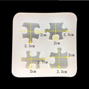 Detailed size view of puzzle-shaped silicone mold compartments for DIY resin casting