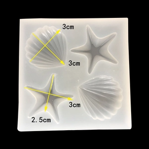 Détail du moule en silicone à 4 cavités avec formes de coquillages et étoiles de mer pour bijoux