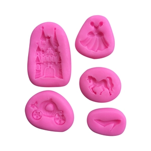 5-piece pink silicone molds featuring castle, pumpkin carriage, and shoe shapes for baking