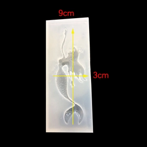Macro view of mermaid-shaped silicone mold with detailed scales and 9cm size marking